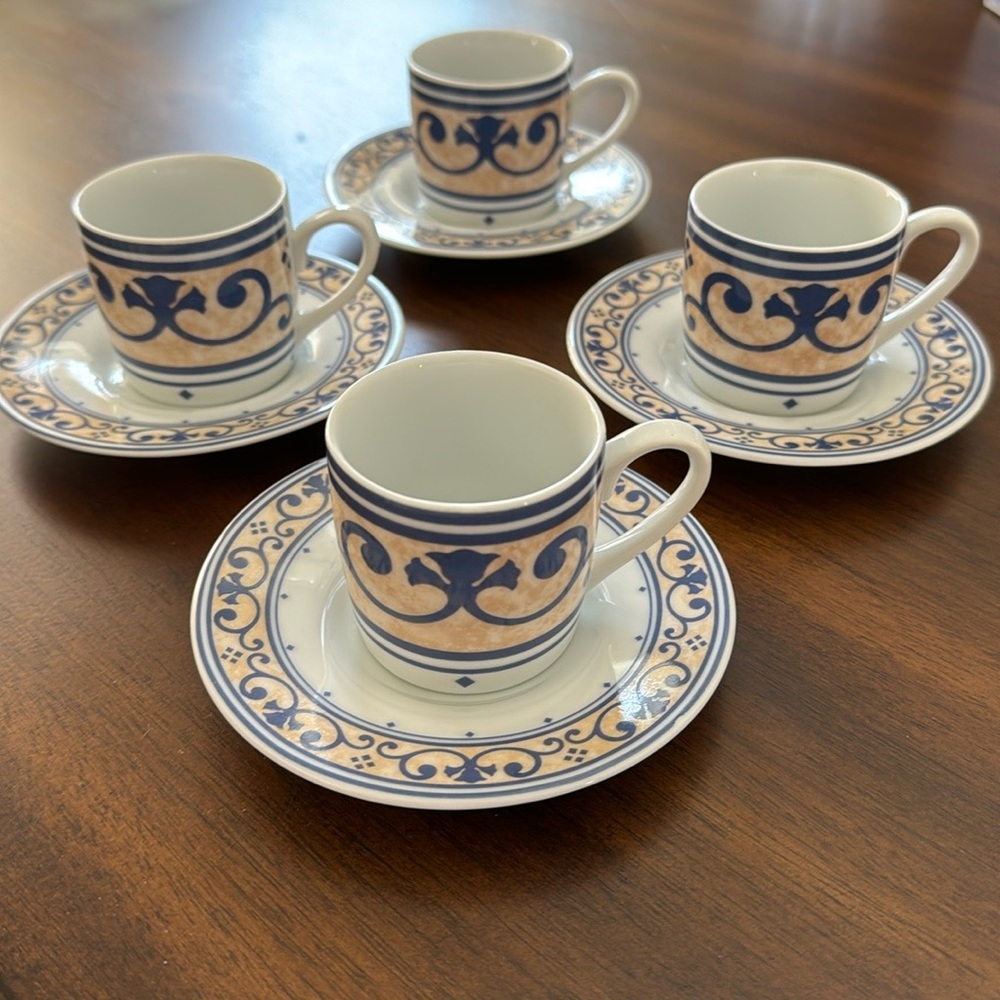 Espresso cups and matching saucers. New.